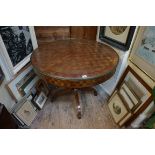 An Edwardian mahogany and parquetry circular centre table, on pedestal base, 89cm diameter, (split