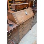 A George III mahogany and walnut crossbanded bureau, 89.5cm wide.