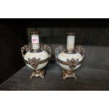 A pair of late 19th century onyx and brass mounted twin handled urns, indistinctly stamped 'Carpe
