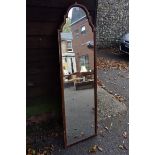 An old mahogany wall mirror.This lot can only be collected on Saturday 10th October (10-2pm)