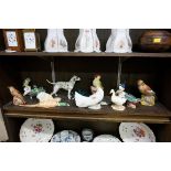 A collection of pottery and porcelain bird models, to include a Royal Worcester jay; a Royal