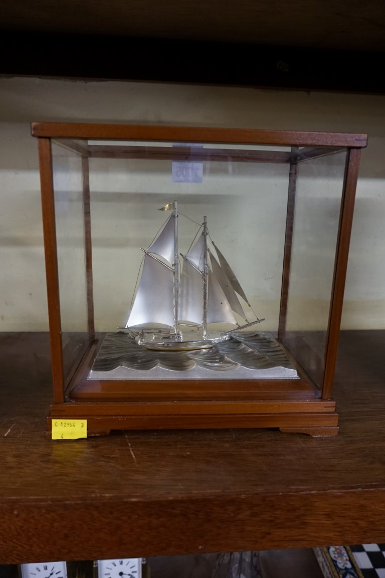 A Japanese silver and silver plated model yacht, by Seki, in glass case, the case 23cm high x 23cm - Image 2 of 3