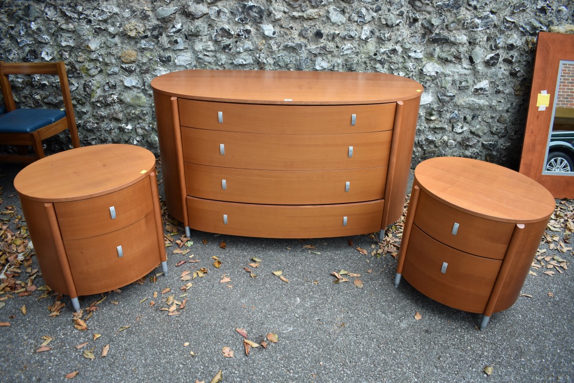 A contemporary cherrywood chest of four long drawers, 131 x 55.5cm; together with a pair of matching