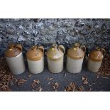 Five stoneware bottles.This lot can only be collected on Saturday 10th October (10-2pm)