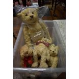 A large Steiff teddy bear, No.00674, 56cm long; together with three other small teddies.