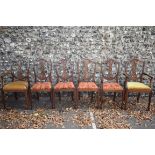 A set of six shield back dining chairs, to include two carvers. This lot can only be collected on