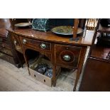 A George III mahogany, line inlaid and crossbanded bowfront sideboard, on square tapering legs,