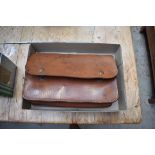 A World War II period military trench saw, by Robco Ltd, Montreal, in tan leather case.