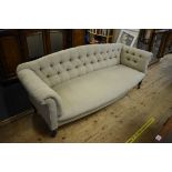 A Victorian Gillows walnut and upholstered Chesterfield settee, both back legs stamped "Gillow", No.
