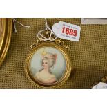 * Riga, bust length portrait miniature of a Louis XVI style lady, signed, on ivory, 5.3cm