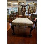 A set of eight late 19th century carved mahogany dining chairs, to include a pair of elbow chairs,