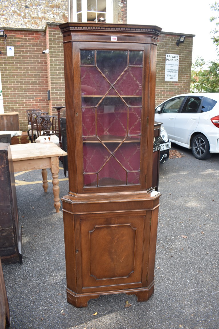 A reproduction mahogany standing corner cupboard. This lot can only be collected on Saturday 10th