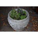 A reconstituted stone garden urn.This lot can only be collected on Saturday 10th October (10-2pm)