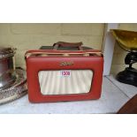 A vintage Roberts R300 transistor radio, with instructions and canvas case.