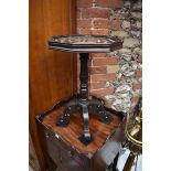 An old Continental stained pine and bone inlaid octagonal occasional table, 39.5cm wide.