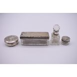 Three silver mounted glass items; together with a circular white metal pill box. (4)