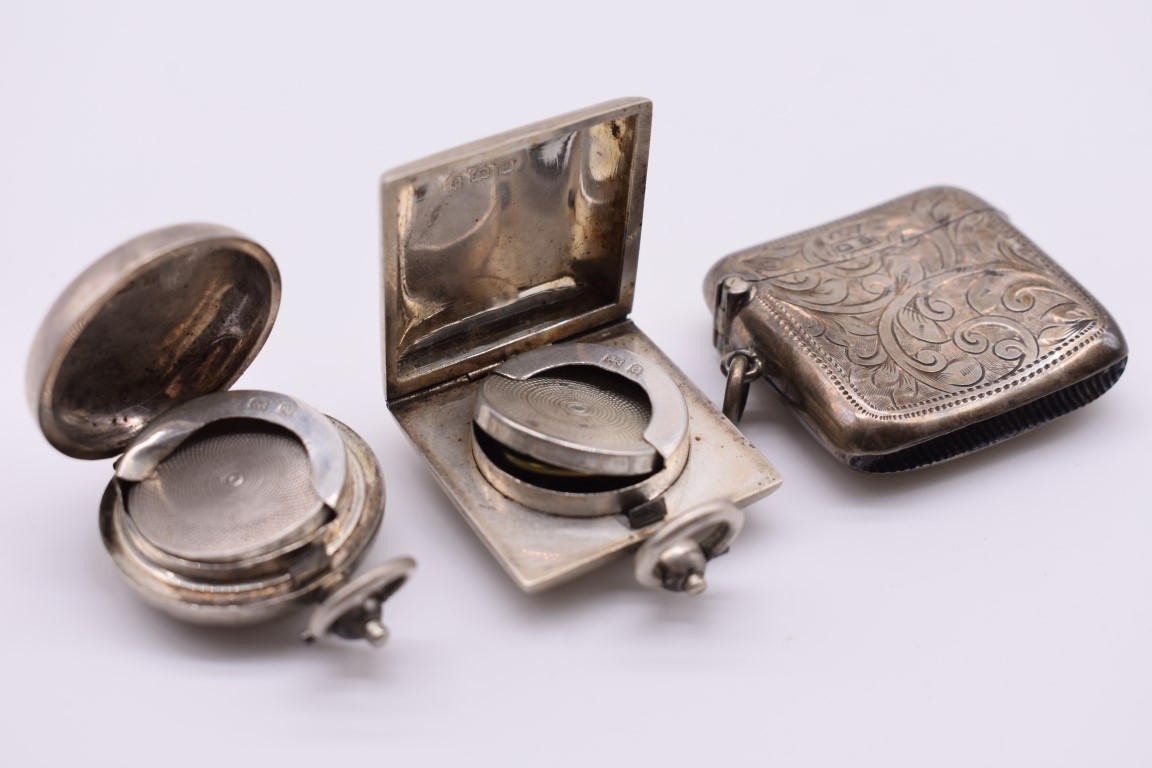 A square silver sovereign case, by Robert Pringle & Sons, Birmingham 1904; together with another