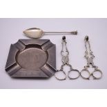 A silver presentation 'Home Guard' ashtray, by Mappin & Webb, London 1943; a silver jam spoon; and