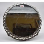 A Portuguese white metal circular easel back mirror, 37.5cm diameter. Has been converted from a