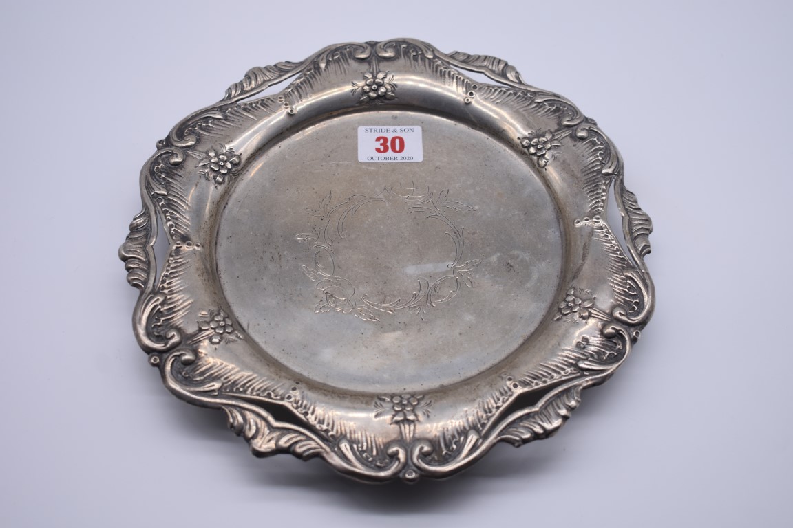 A Portuguese white metal pierced salver, by JAS, Porto, 24cm diameter.