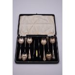A cased set of six silver teaspoons and sugar tongs, by A J Bailey, Birmingham 1929, 108g.