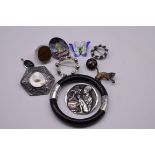 A small group of silver and other metal jewellery, to include a sterling silver ethnic brooch, by