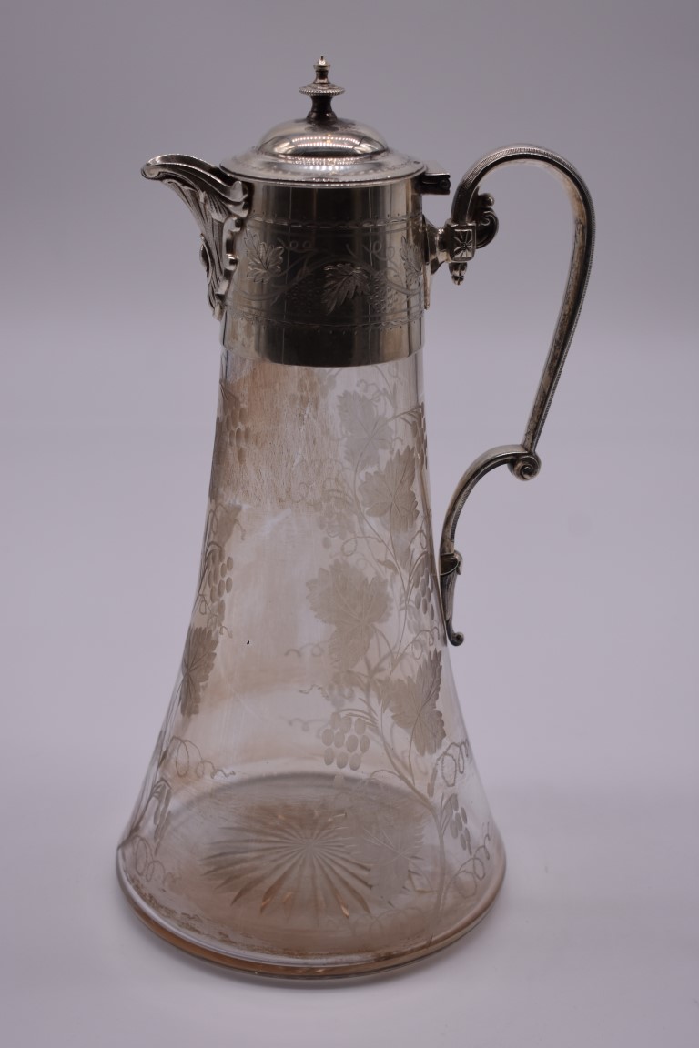 An Edwardian silver mounted etched glass claret jug, by Hukin & Heath, Birmingham 1903, having grape