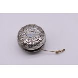 A sterling silver mounted yo-yo, by Gorham, 5.5cm diameter.