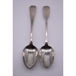 A George III silver fiddle pattern tablespoon, by T Cox Savory, London 1828; together with a