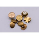 A pair of 15ct gold oval cufflinks, 10g; together with four gold coloured studs.