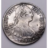 Coins: a Carolus IIII 1796 silver Mexico eight Reales.