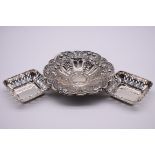A pair of pierced silver pin dishes, by E J Houlston, Birmingham 1924, 9 x 9cm, 96.5g; together with