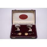 A cased pair of cast silver gilt lined salts and spoons, by Richard Lawton Ltd, London 1989, 4.5cm