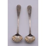 A pair of Irish George III bright cut silver sauce ladles, makers mark indistinct, Dublin 1794,