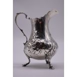 A Victorian silver baluster milk jug, by John Keith, London 1853, 13.5cm high, 173g.