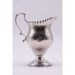 A Victorian silver milk jug, by John Henry Rawlings, London 1894, 10.5cm high, 87g.