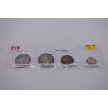 Coins: a group of UK silver coins; comprising an 1821 crown; a 1937 crown; an 1887 half crown; and a