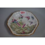 A Chinese famille rose pedestal dish, 19th century, of hexagonal form, painted with butterflies,