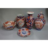 A small collection of Japanese Imari porcelain, largest 32.5cm high. (5)