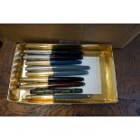 A small collection of vintage Parker pens; together with a Delarue 'Dainty' fountain pen, with