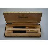 A vintage Parker '61' pen set, cased.