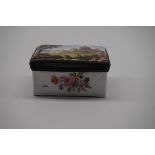 A late 18th century Continental enamel box, the hinged cover painted with figures in a landscape,