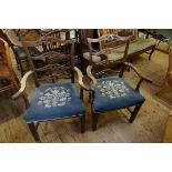 (THH) A pair of antique ladderback elbow chairs.