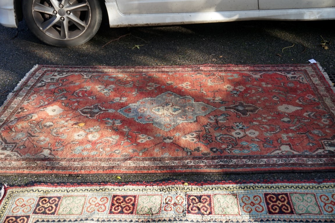 A Persian rug, having geometric borders, 198 x 140cm; together with one other rug having floral - Image 3 of 5