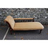 (THH) A mahogany peach upholstered chaise longue, 163cm long x 58cm deep x 73cm high. This lot can