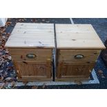 A pair of modern pine bedside cabinets, 43cm wide. This lot can only be collected on Saturday 19th