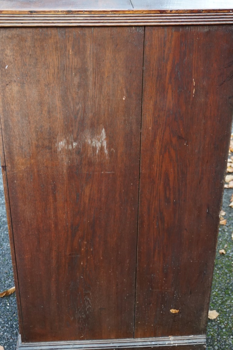 An antique oak chest of four drawers, converted from a secretaire, 101cm high x 98cm wide x 53cm - Image 7 of 7