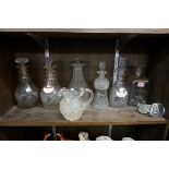 (THH) A collection of antique glass decanters and similar, to include a pair of early 19th century