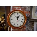 An old circular wall clock, the 11.5in dial inscribed 'Anglo Swiss Watch Co, Admiral'.