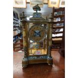 A late 19th century gilt brass, champleve enamel and onyx four glass mantel clock, 38.5cm high, with